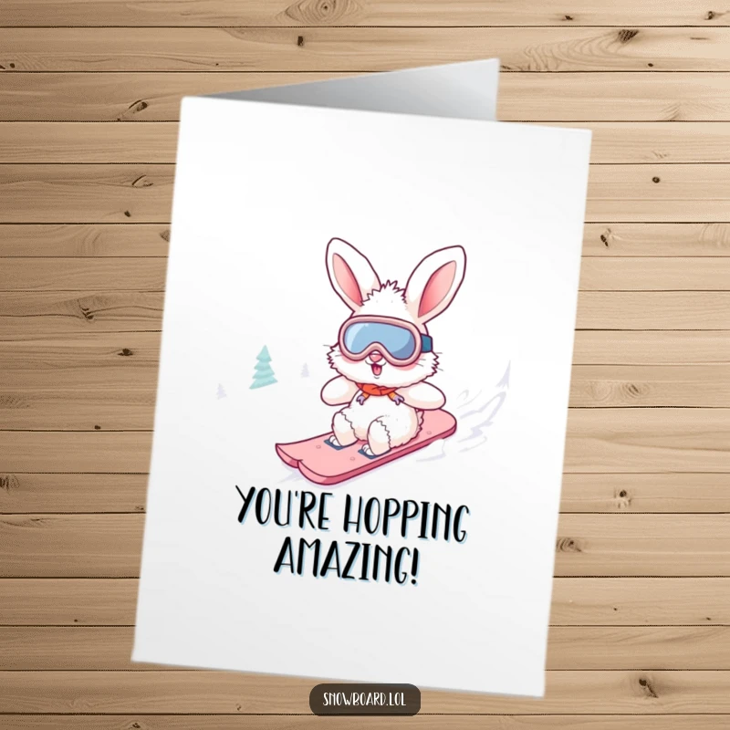 Funny Free Printable Congratulations Card: A fluffy bunny in goggles celebrates a win while snowboarding down a snowy hill.