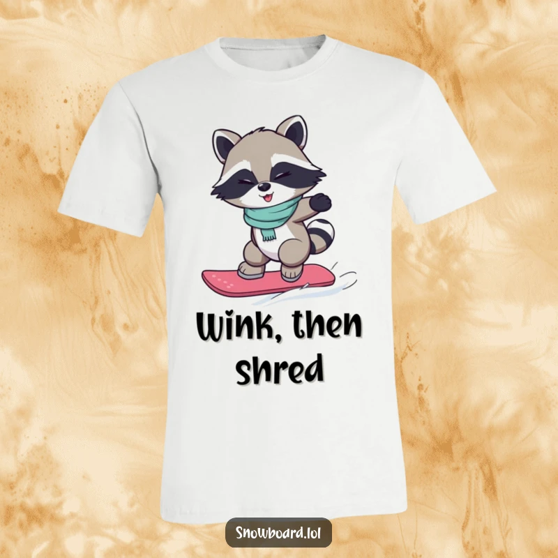 Funny t-shirt featuring a winking raccoon mid-air during a small snowboard jump, capturing a moment of cheeky fun.