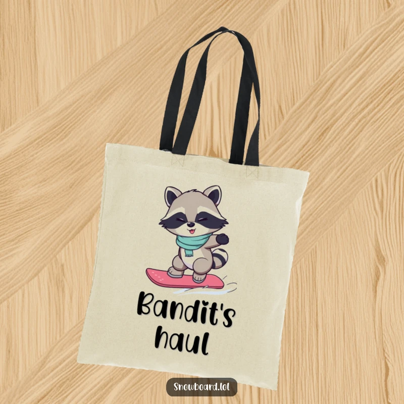 Funny tote bag featuring a winking raccoon performing a snowboard jump, showcasing agility and mischievous intent.